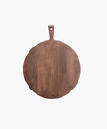 Round wooden cutting board with a rich, dark brown finish. It has a smooth surface and a handle with a hole at the top for hanging. | Wildwood Home Co.