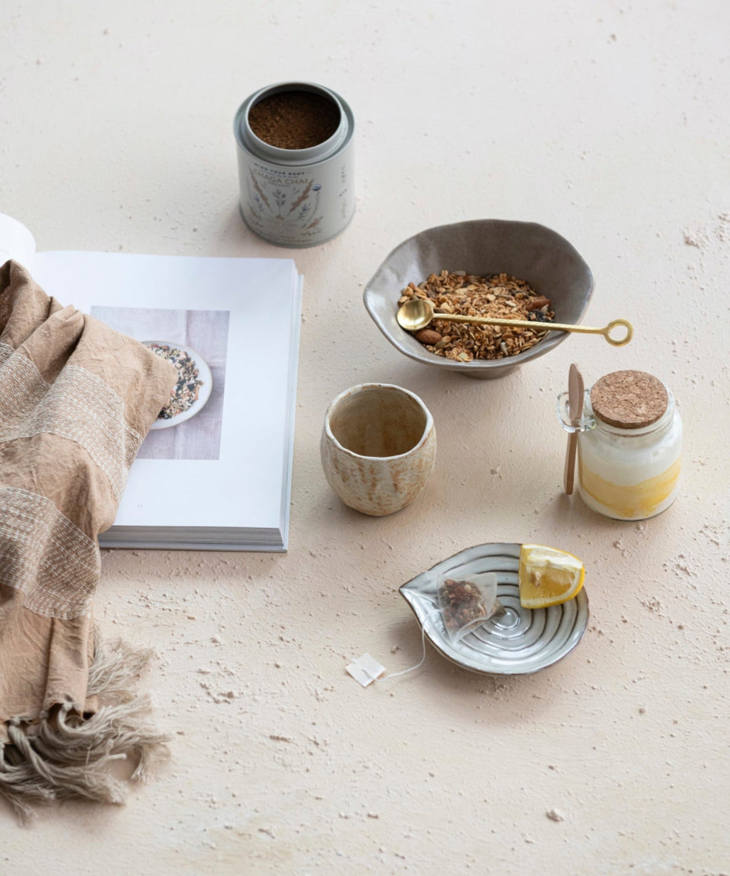 Embossed stoneware dish or spoon rest with reactive glaze styled with kitchen wares. | Wildwood Home Co.